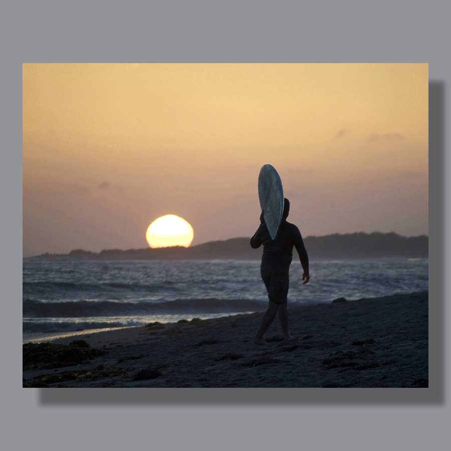 Image: Surfer on San Onofre Beach at sunset